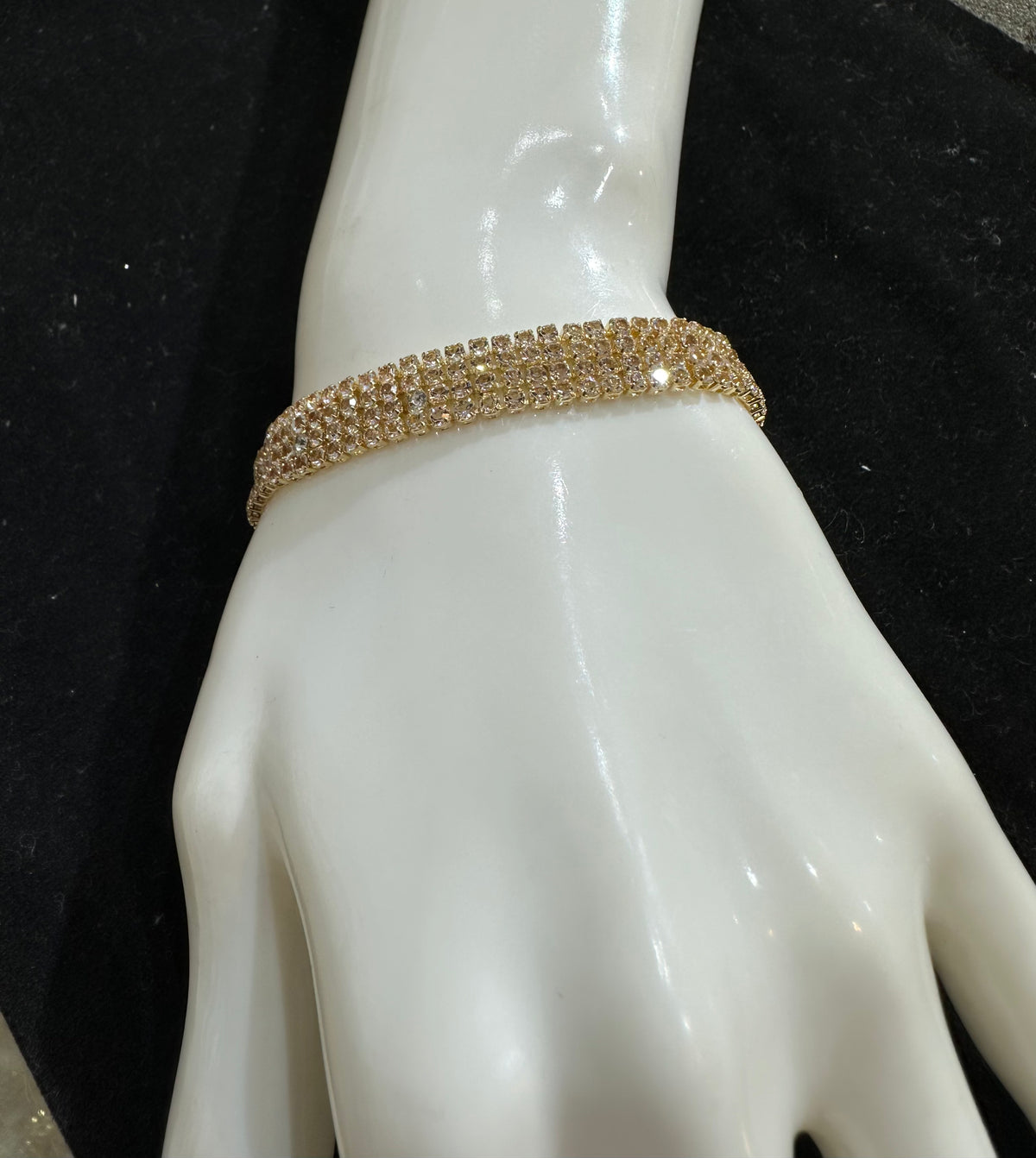 PA123 Gold colour bracelet with white stones