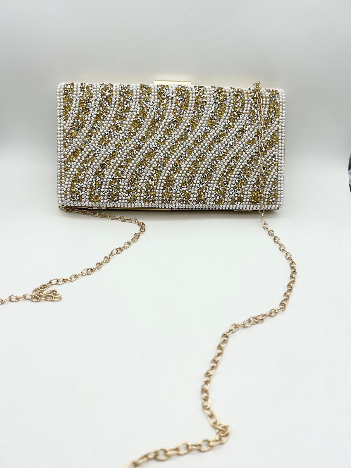 AM700 Gold and White clutch bag