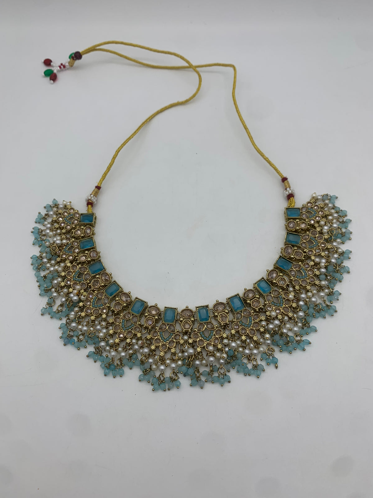 Am 011 Gold and pastel blue necklace set