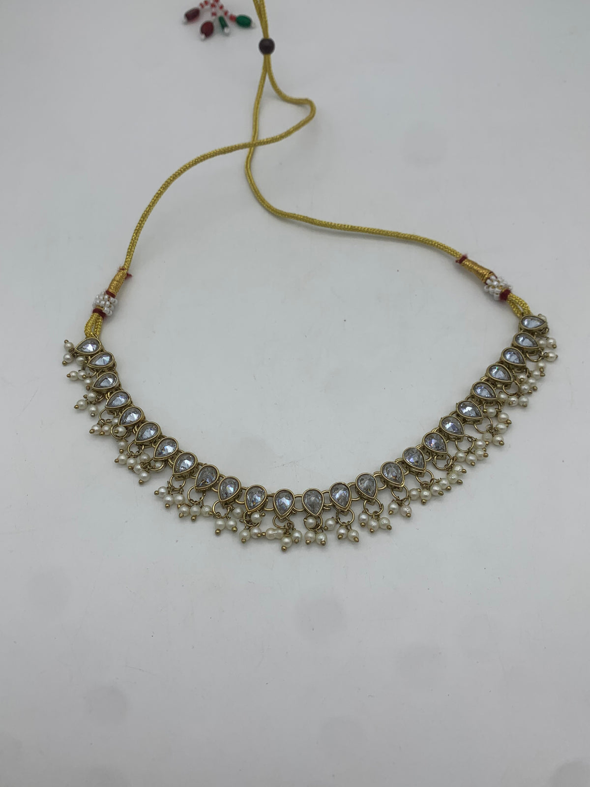 Am 008 Gold and white necklace set