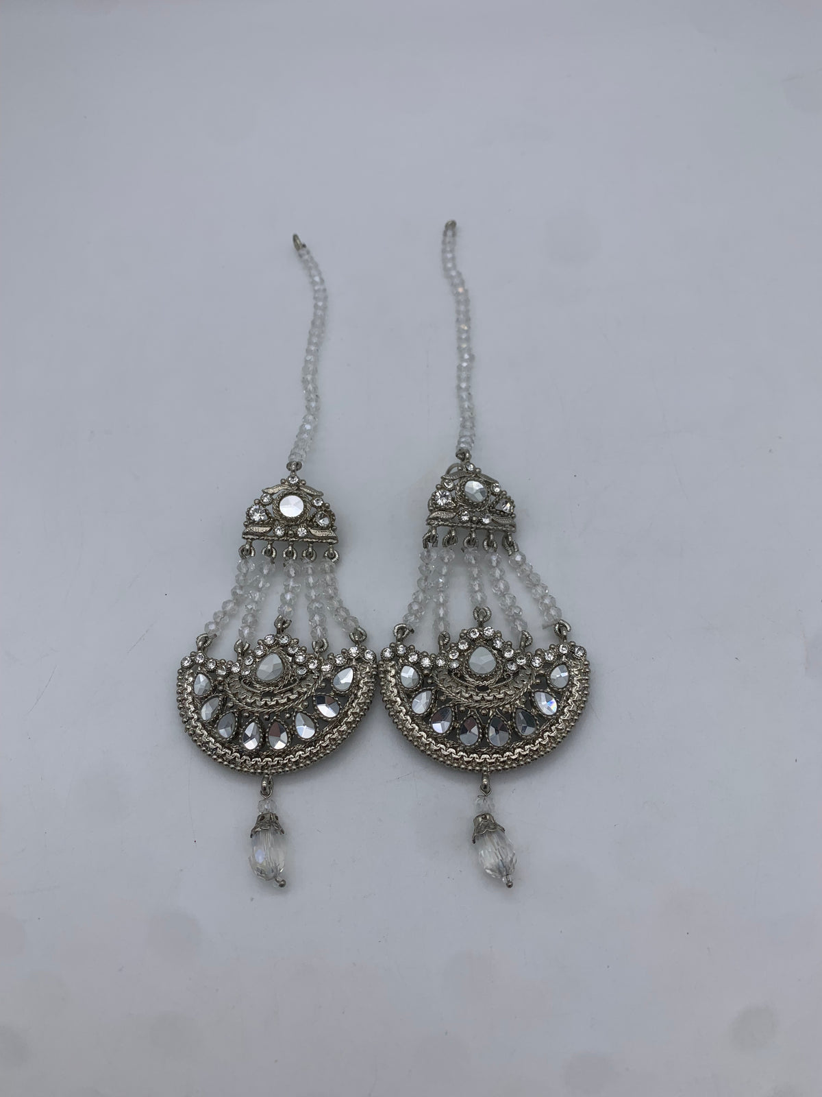 Am 000White earrings with Sahara