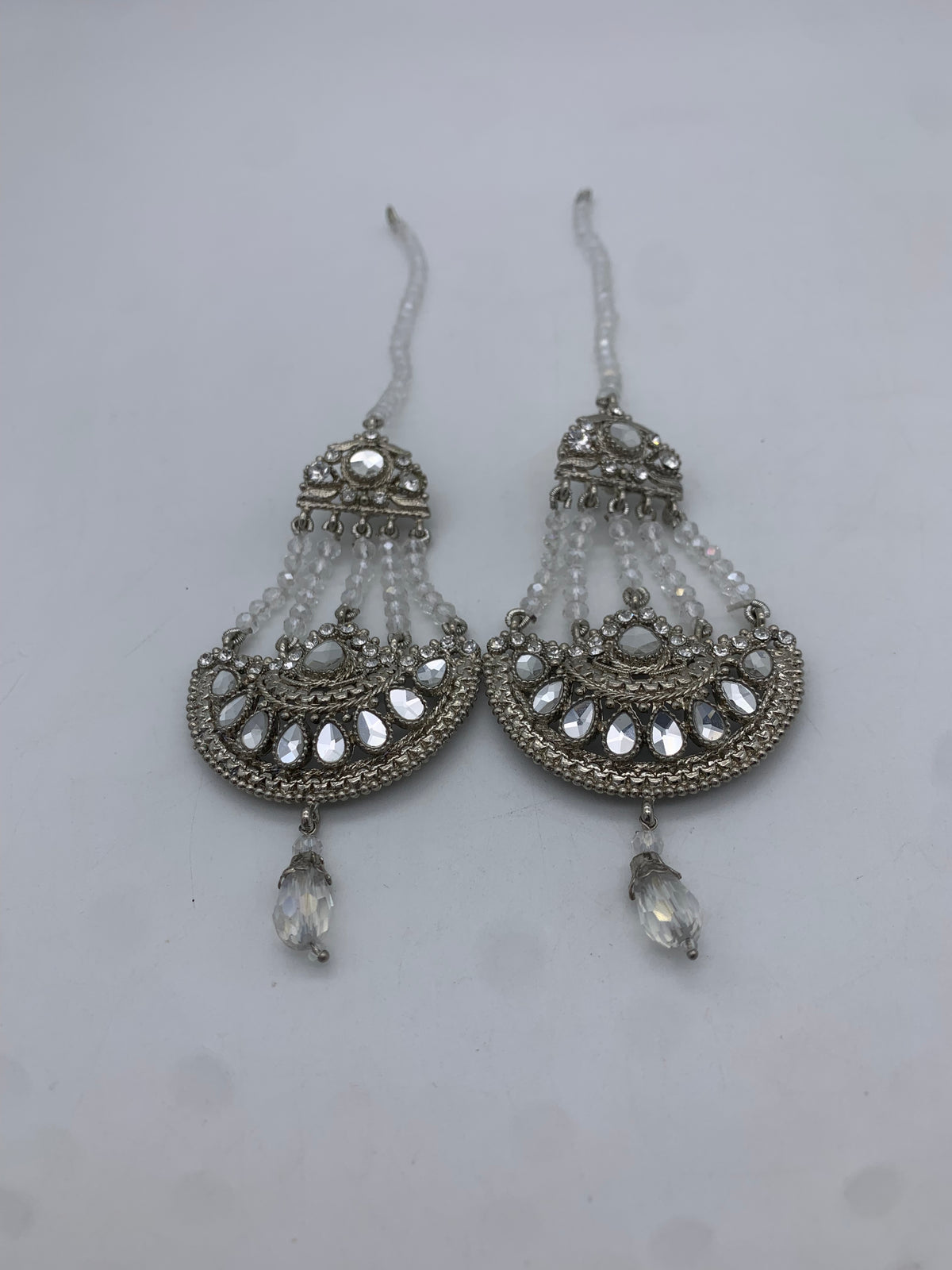 Am 000White earrings with Sahara