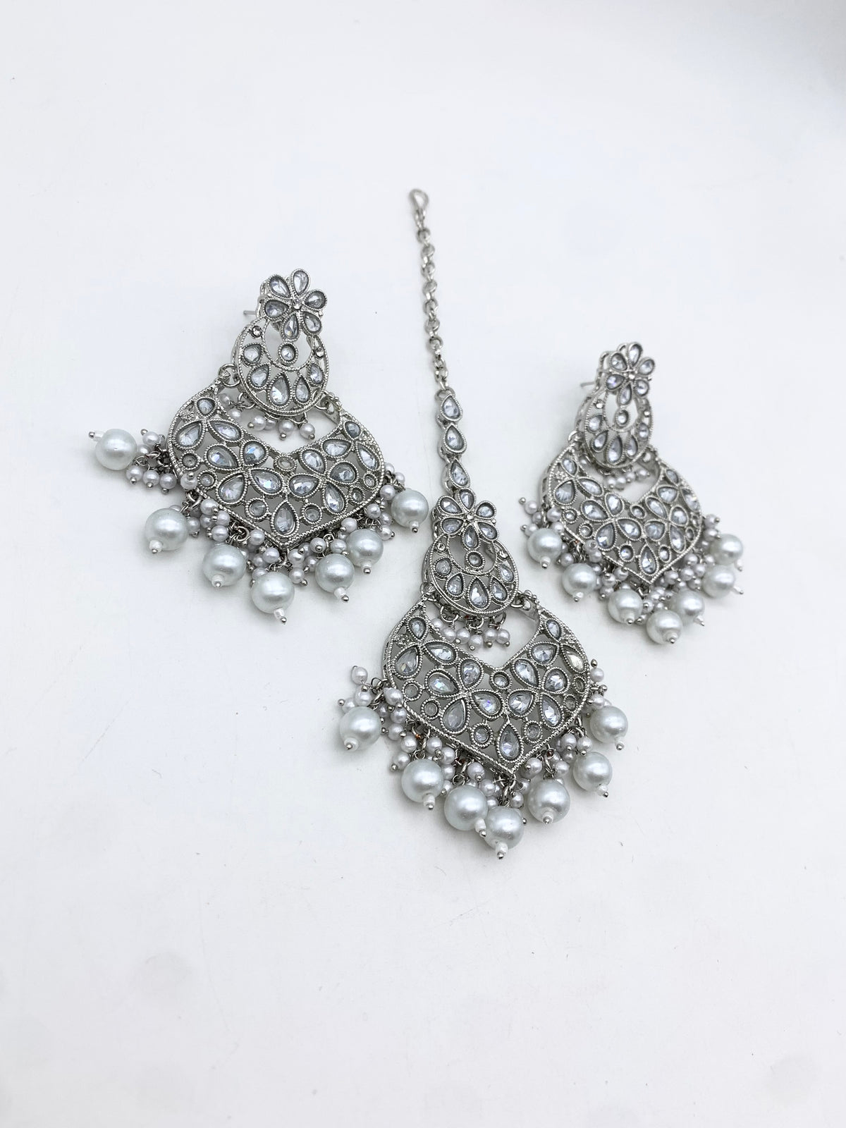 AM 600 Silver earring and tikka set polki