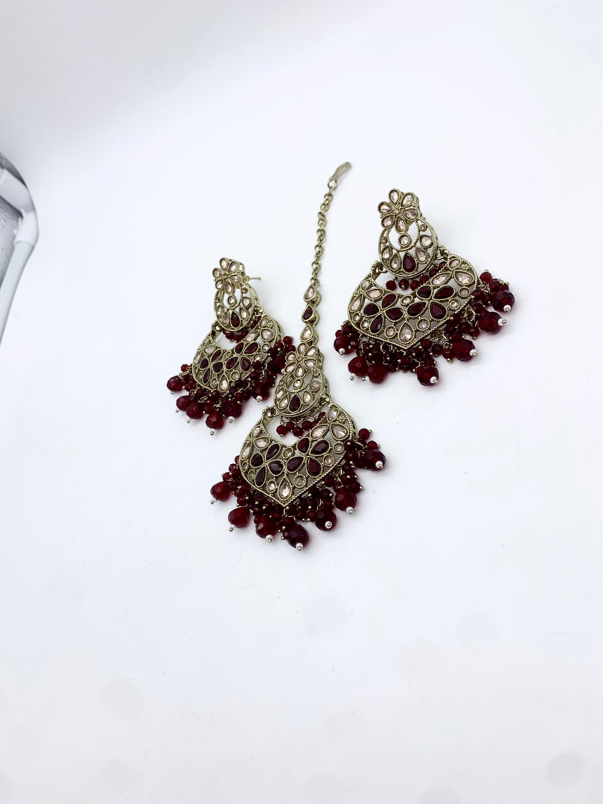 AM600 Gold and Maroon earrings and tikka set